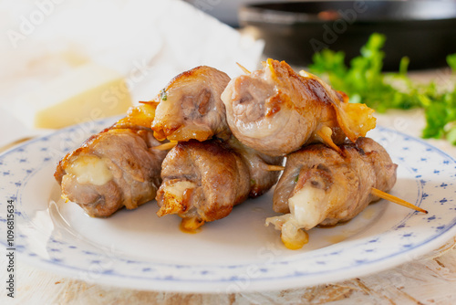 Traditional Italian meat rolls stuffed with cheese and herbs, called Bombette Pugliesi.