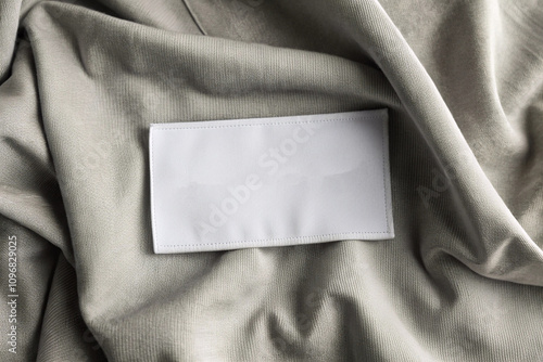 Blank white laundry care clothes label on  texture background generative ai
