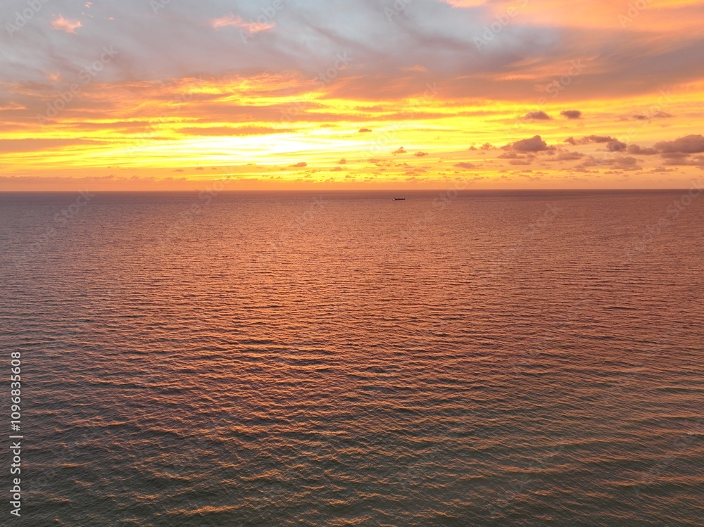 Spectacular sunrise over Miami Beach with the Ocean and Buildings glowing Spectacular sunrise over Miami Beach with the Ocean and Buildings glowing