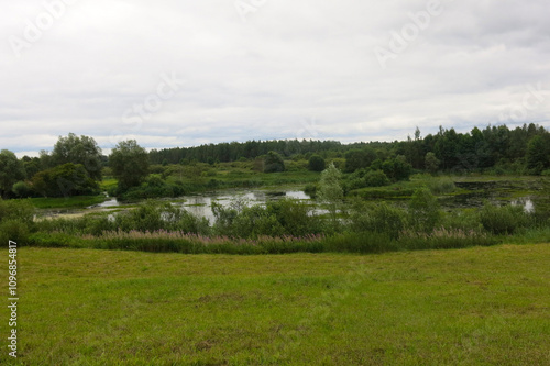 Orekhovno Landscape Park in the Pskov region. View of the picturesque pond photo