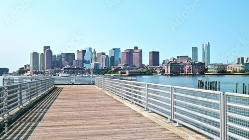 The skyline of the historic Boston in Massachusetts, USA as seen from East Boston on a sunny day across the channel. photo