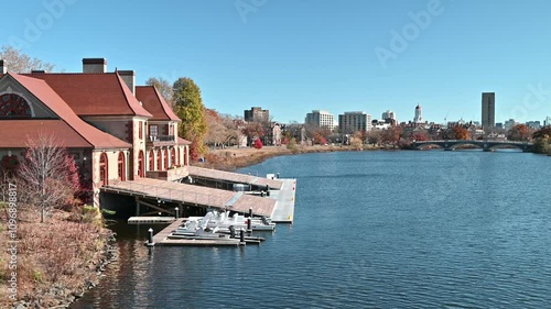 The iconic architecture of Cambridge and Boston in Massachusetts, USA on a sunny day with the famous Charles river and some red brick buildings and skyscrapers. photo