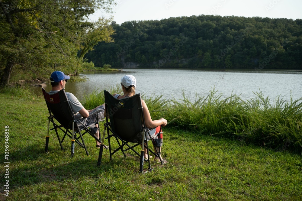 Couple enjoys the scenic view at Lake of the Ozarks in Missouri Couple enjoys the scenic view at Lake of the Ozarks in Missouri