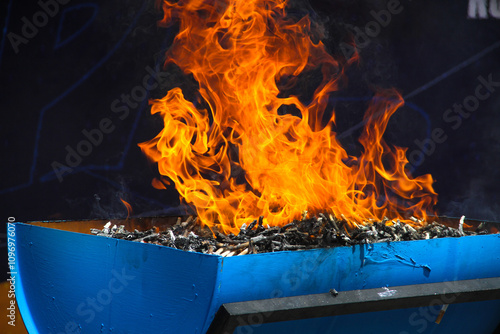 Fire blazing burning illegal cigarettes. copy space, background, fire effect