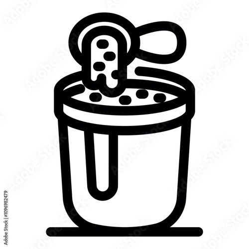 Spoon pouring instant coffee granules into a cup, creating a quick and flavorful caffeine fix
