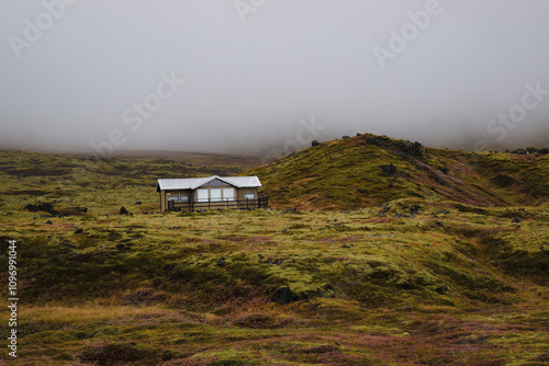 House in the fog in Iceland photo