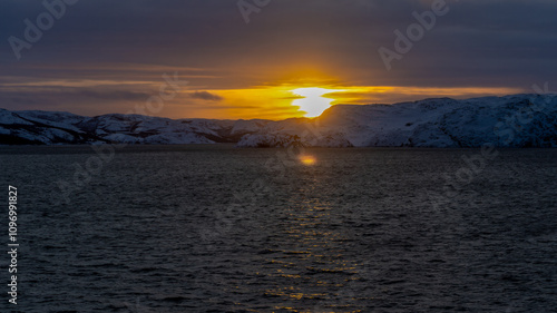 sunset over the sea in orange and yellow