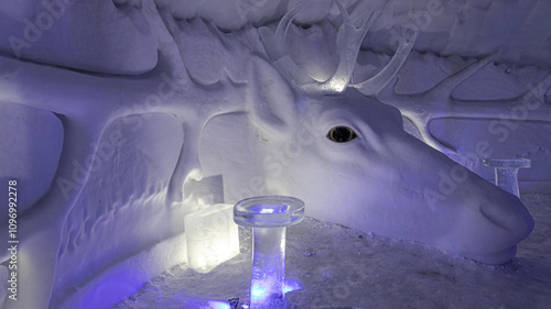 a reindeer carved into a ice cave for Christmas