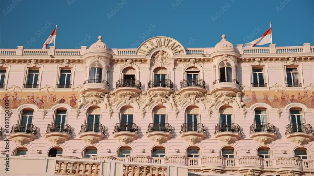 The facade of Hotel de Paris in daylight, Monaco The facade of Hotel de Paris in daylight, Monaco