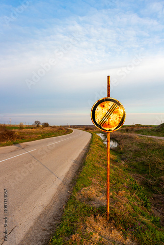 Old weathered road sign 