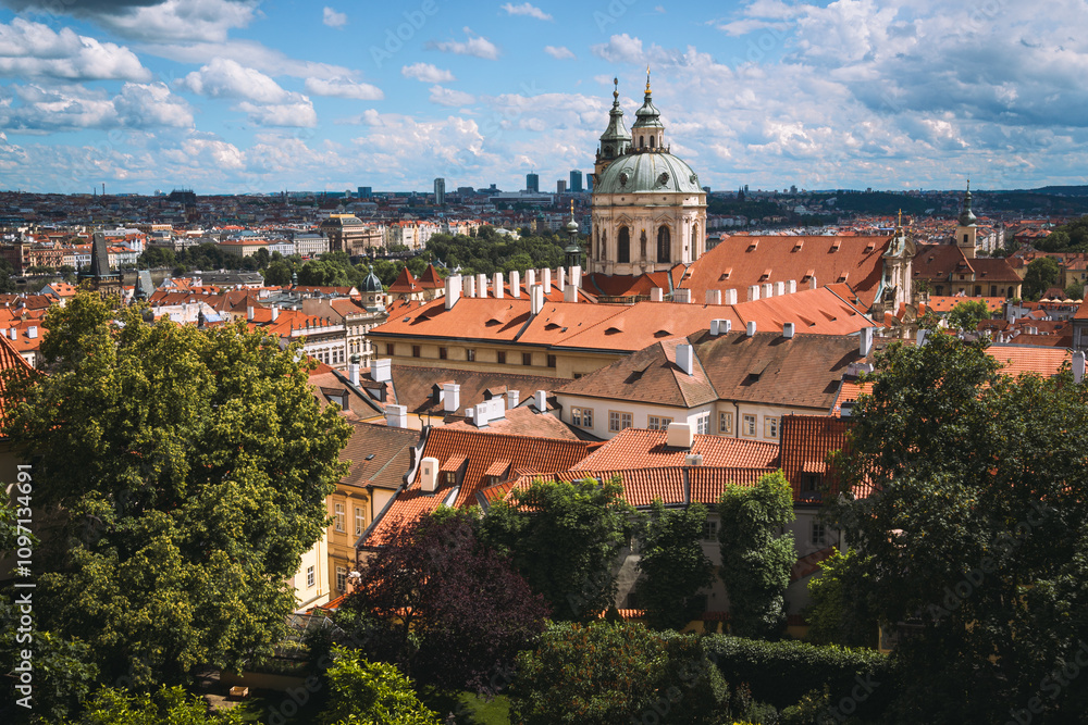 Fototapeta premium Scenic View of Malá Strana Rooftops and St. Nicholas Church in Prague