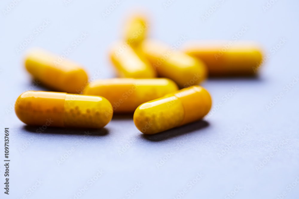 Vitamin C capsules. Bright background. Close up. Copy space. Vitamin C capsules. Bright background. Close up. Copy space.
