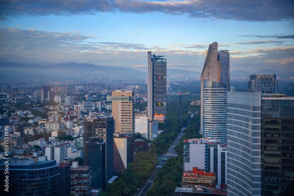 Fototapeta premium Mexico City Skyline, Skyscrapers, and Landmark Buildings in Ciudad de México: Beautiful vibrant historic metropolis in rain at 7,350 ft