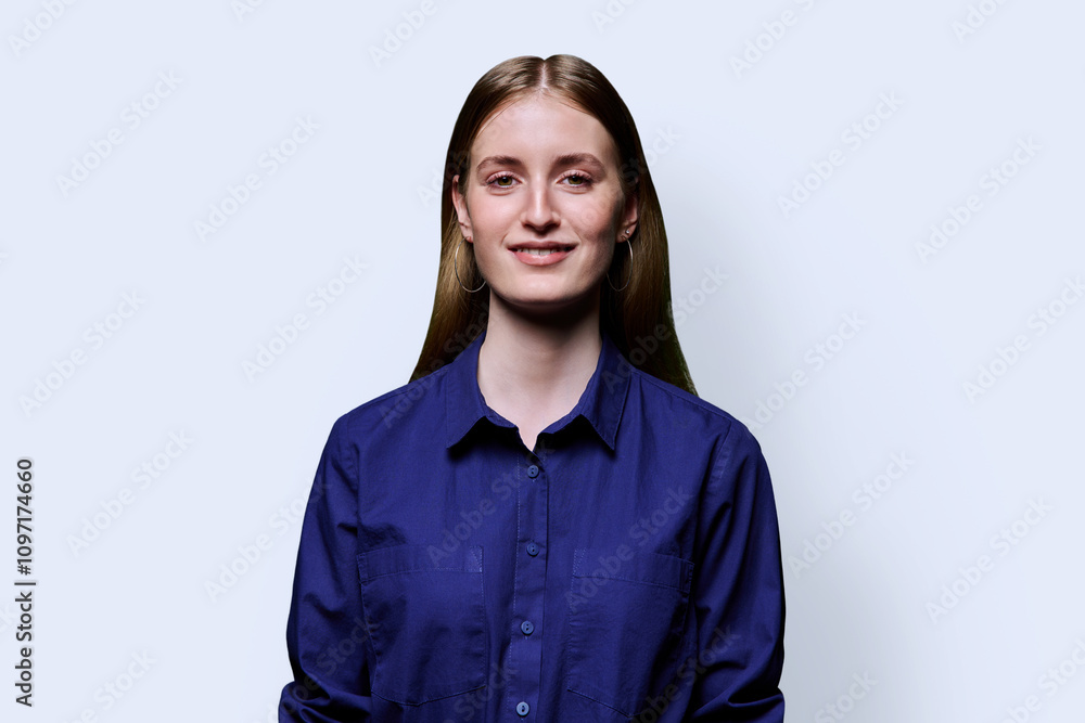 Portrait of beautiful young girl looking at camera on white background Portrait of beautiful young girl looking at camera on white background