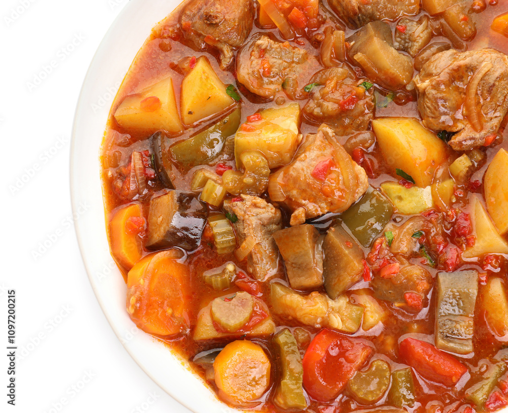 Delicious stew with vegetables in bowl isolated on white, top view Delicious stew with vegetables in bowl isolated on white, top view
