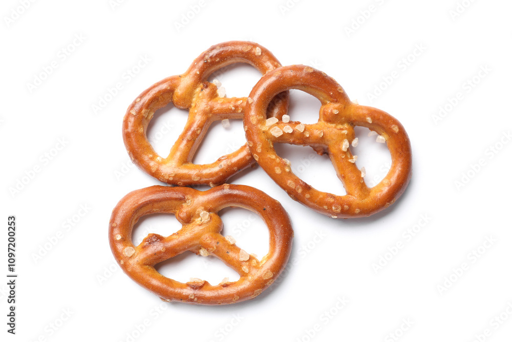 Many delicious pretzel crackers isolated on white, top view Many delicious pretzel crackers isolated on white, top view