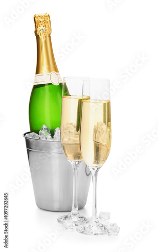 Champagne and bucket with ice isolated on white