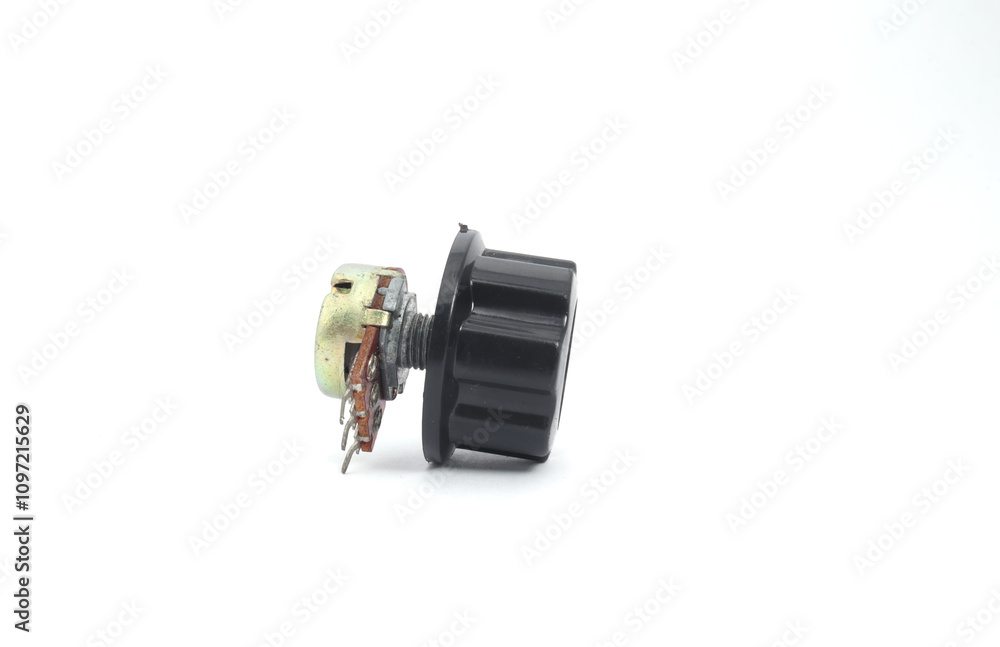 A variable resistor or potentiometer with a black knob on a white background. Used for electronics and robotics enthusiasts. A variable resistor or potentiometer with a black knob on a white background. Used for electronics and robotics enthusiasts.