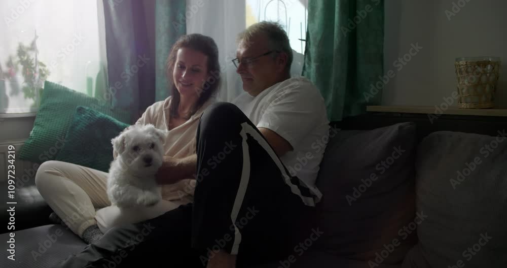 Couple spending quality time together with dog, relaxed indoors on sofa, embracing serene and cozy atmosphere, fostering love, connection, and companionship Couple spending quality time together with dog, relaxed indoors on sofa, embracing serene and cozy atmosphere, fostering love, connection, and companionship
