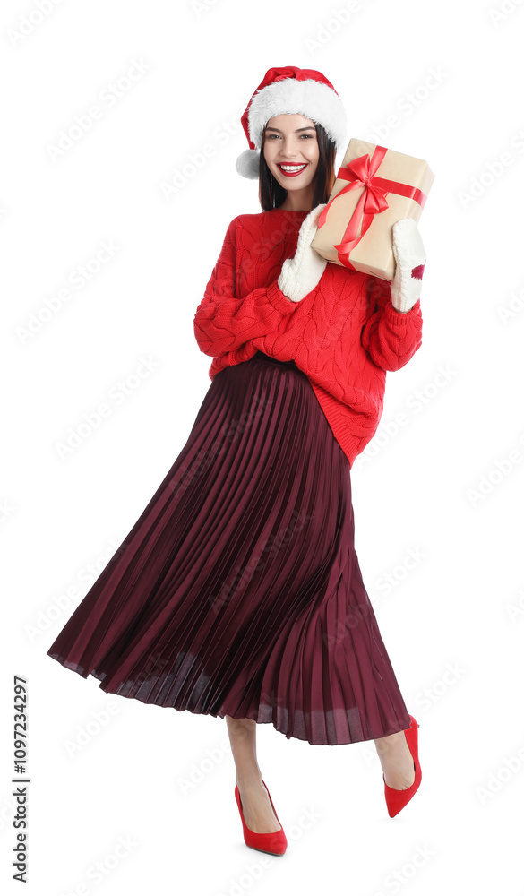Woman in Santa hat, knitted mittens and red sweater holding Christmas gift on white background Woman in Santa hat, knitted mittens and red sweater holding Christmas gift on white background