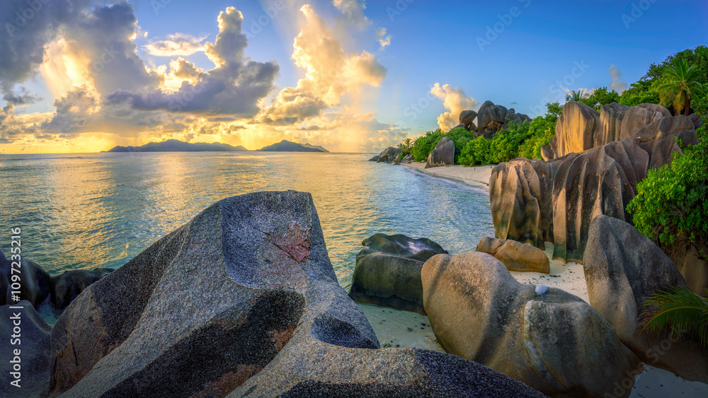 sunset at tropical beach anse source d'argent on la digue on the seychelles