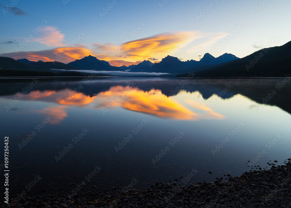 sunrise over a lake. Lake McDonald, Glacier National Park, Montana. sunrise over a lake. Lake McDonald, Glacier National Park, Montana.
