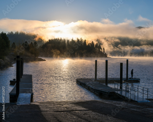 Sunrise on a foggy morning boat dock at Couer d'Alene Lake Idaho