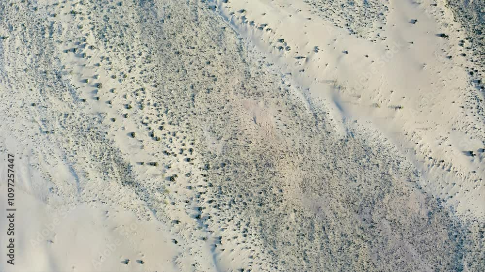 Aerial view of the dunes of Corralejo Natural Park in Fuerteventura Island, Spain. Aerial view of the dunes of Corralejo Natural Park in Fuerteventura Island, Spain.