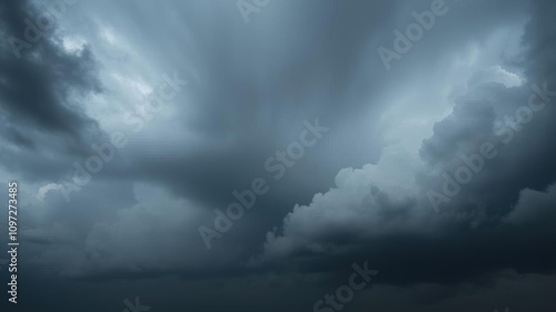 Panorama of cumulus fluffy white and dark gray storm clouds in rainy weather, thunderstorm, cumulus