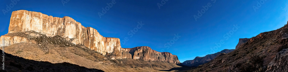 Big Bend Beauty: The dramatic landscape of Big Bend National Park, with towering cliffs and a clear blue sky. Big Bend Beauty: The dramatic landscape of Big Bend National Park, with towering cliffs and a clear blue sky.