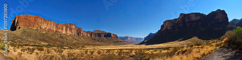 Big Bend Beauty: The dramatic landscape of Big Bend National Park, with towering cliffs and a clear blue sky.