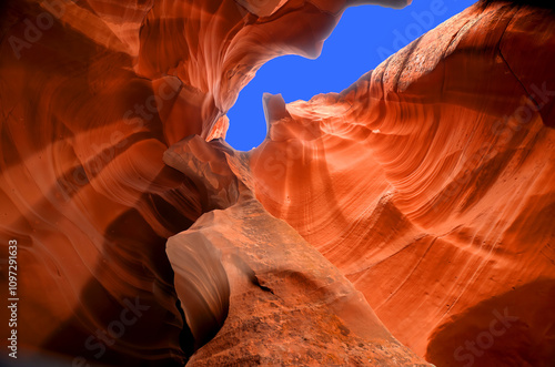 Antelope Canyon is a slot canyon in the American Southwest. It is on Navajo land east of Page, Arizona. Antelope Canyon includes two separate, scenic slot canyon sections