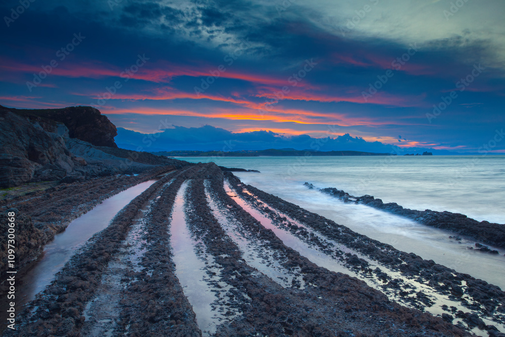 Ridges of Time Beneath a Fiery Sky
