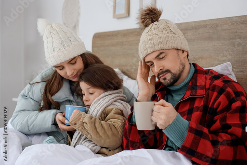 Frozen family with cups of ...
