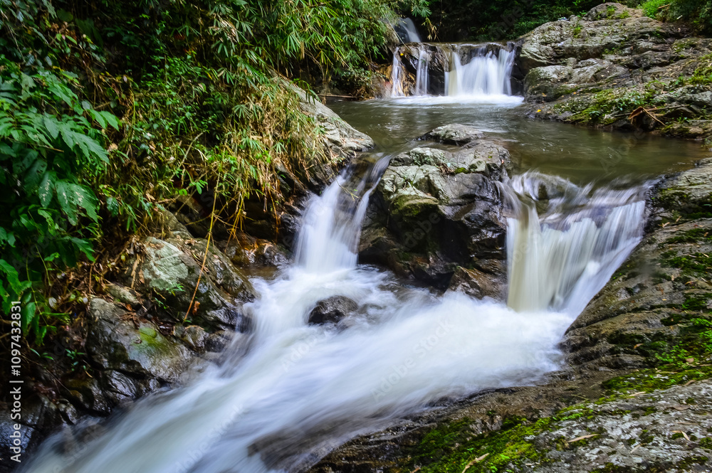 Mae wong waterfall in jungle at Doi Saket chiangmai Northern Thailand,South East Asia Mae wong waterfall in jungle at Doi Saket chiangmai Northern Thailand,South East Asia