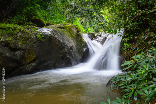 Mae wong waterfall in jungle at Doi Saket chiangmai Northern Thailand,South East Asia photo