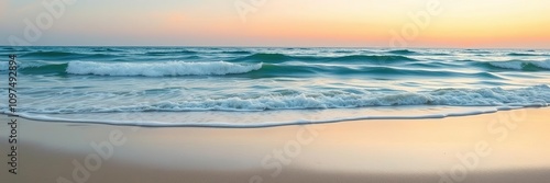 Serene beach scene with soft blue waves on a serene abstract background at sunrise, serenity, soft colors