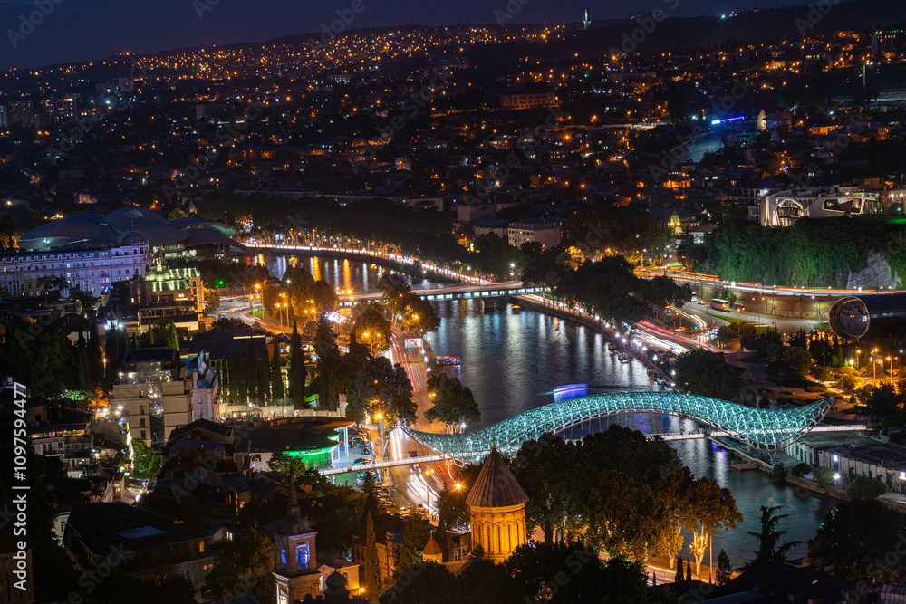 view from above of Tbilisi city in the dark, night landscape