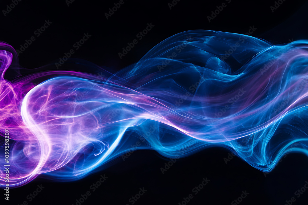 Fototapeta premium Colorful smoke swirling in abstract patterns creating a mesmerizing visual effect at night