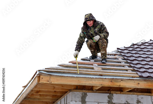 Wallpaper Mural A man is on a roof, measuring the roof with a tape measure Torontodigital.ca