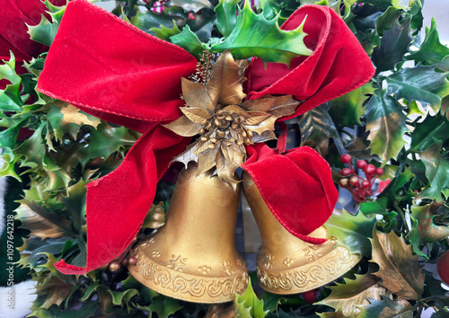 Christmas bells with red cloth and mistletoe 