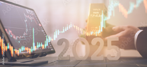 Obraz na płótnie 2025 Investment Trends: Businessman Holding Gold Bar with Digital Financial Charts and Market Indicators w salonie