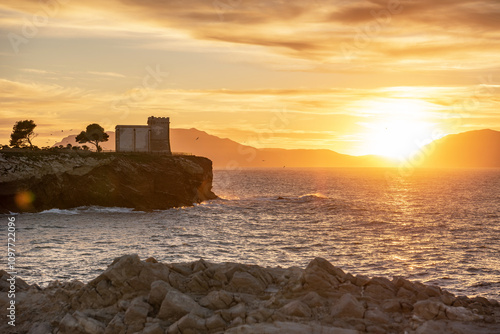 The Tower Alba or Tower of Cala Rossa, is a defense tower on the coast of the Mediterranean sea in Terrasini, province of Palermo, Sicily, Italy