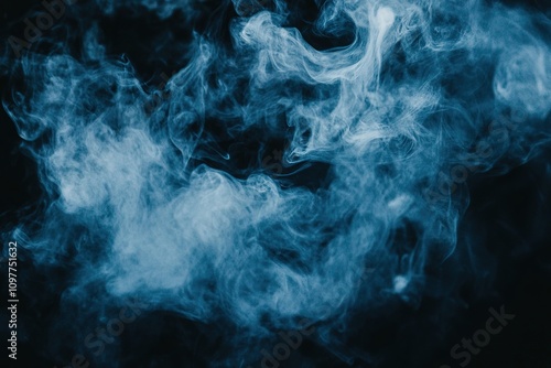 Swirling blue smoke on dark background, ethereal and mysterious