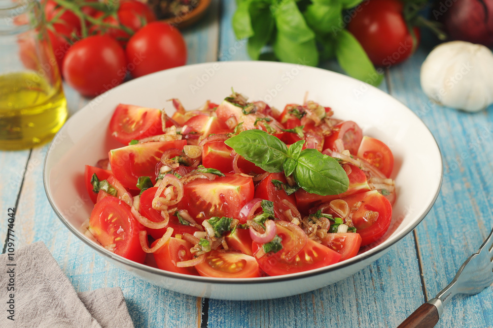 A bowl with Romanian tomato salad de Rosii A bowl with Romanian tomato salad de Rosii