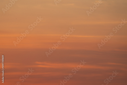 summer evening, sunset in yellow, orange and pink with clouds, background