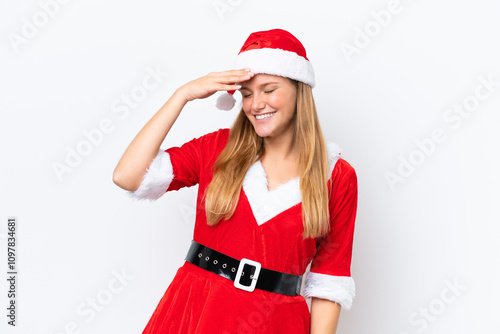 Young caucasian woman dressed as mama noel isolated on white background smiling a lot