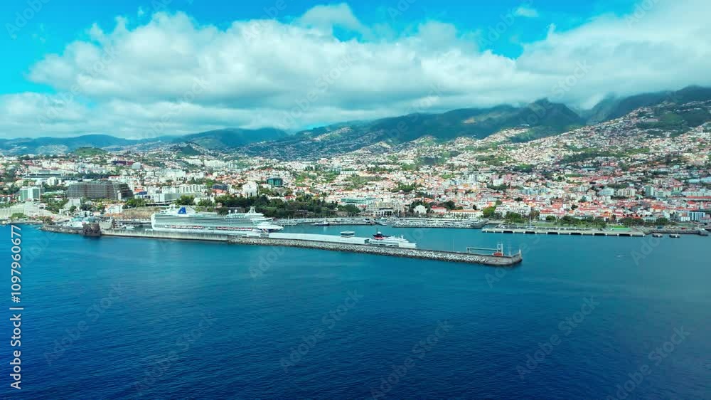 Aerial view from sea of Funchal marina with cruise passenger ship moored, Madeira Island, Portugal Aerial view from sea of Funchal marina with cruise passenger ship moored, Madeira Island, Portugal