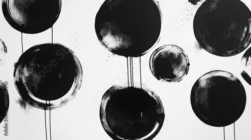 Multiple black ink circles with visible drips, forming a minimalist abstract pattern on white
