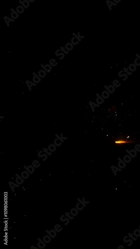 Close-Up Slow-Motion Footage of a Blasting Cracker (Walla) Against a Black Background | Vibrant Fireworks Display photo